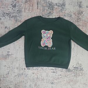 Green Sweater with Colorful Bear Design
